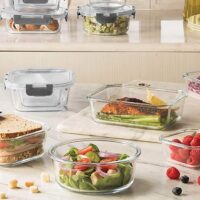 Close-up of glass food containers filled with food in the kitchen