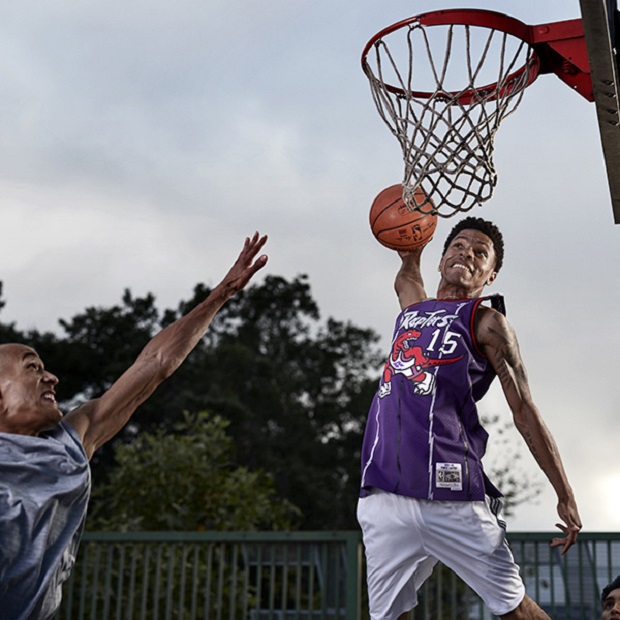 picture of two men playing basketball