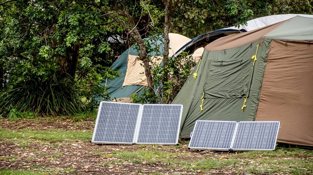 two camping solar panels and camps