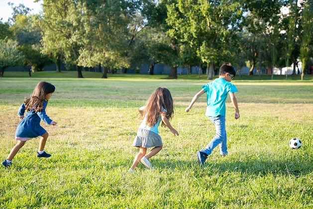 kids playing football