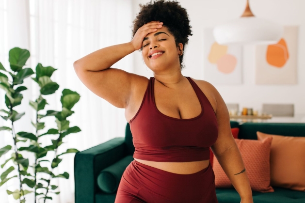 plus size woman wearing red workout clothes