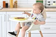 baby sitting in a high chair