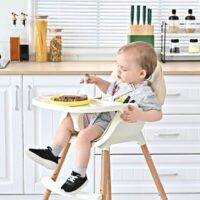 baby sitting in a high chair