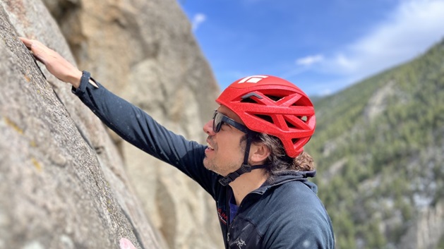 Man with climbing helmet