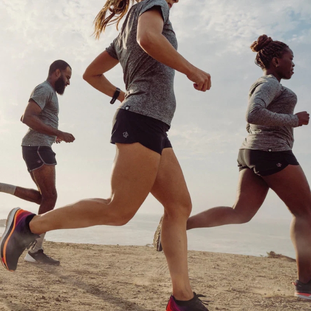 people running wearing rabbit running apparel