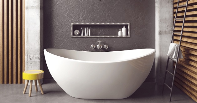 a freestanding bathtub in an aesthetic bathroom